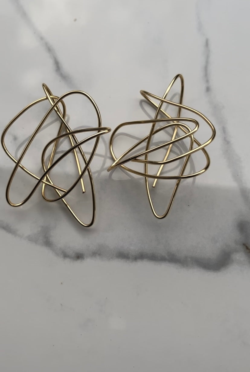 gold wire statement earrings